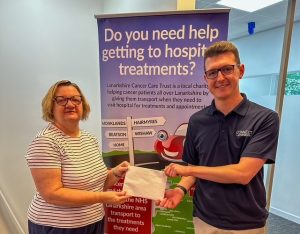 Gary Poderis presents cash donation to Lanarkshire Cancer Care Trust